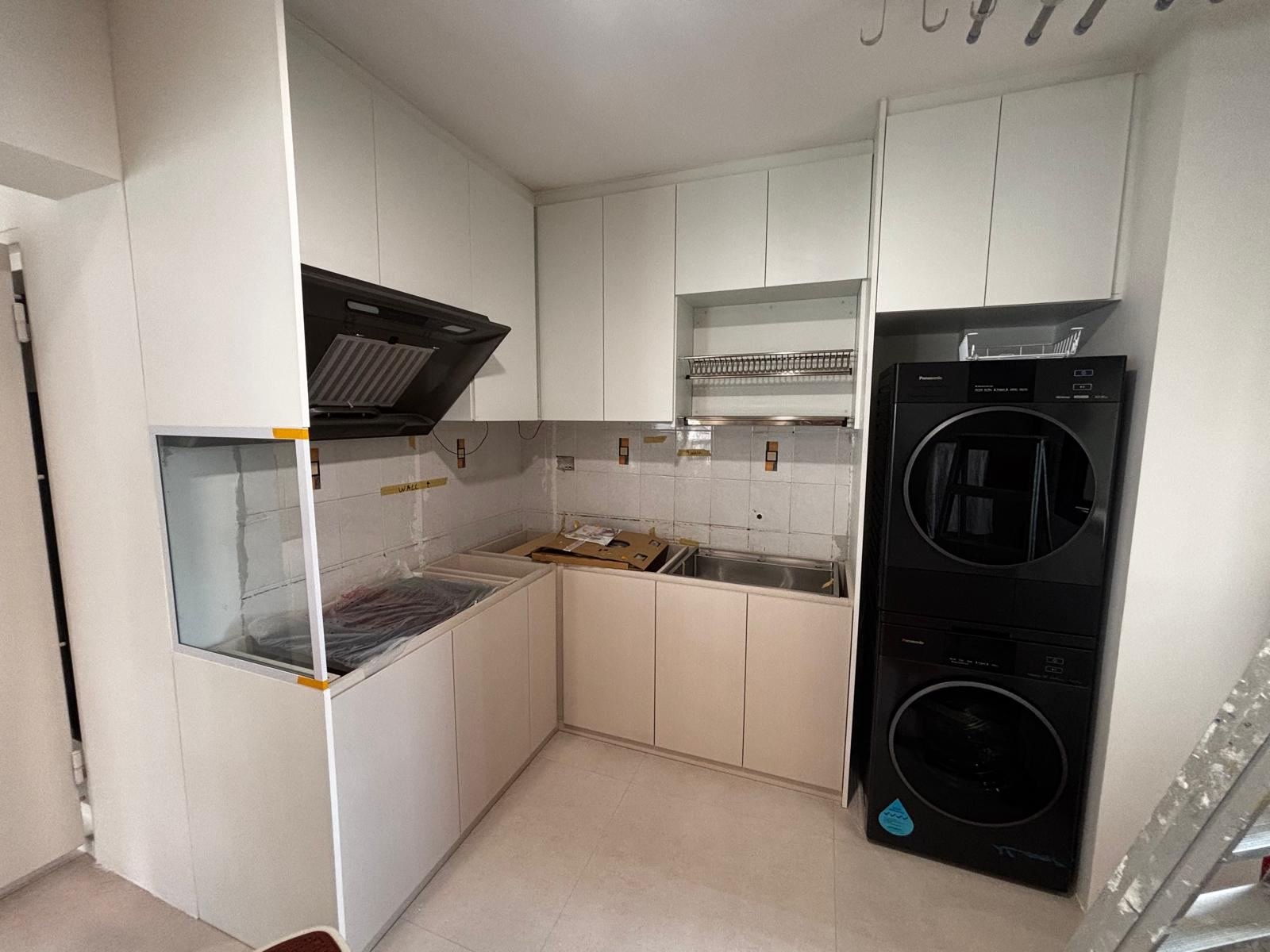 White aluminium kitchen cabinets with integrated appliances