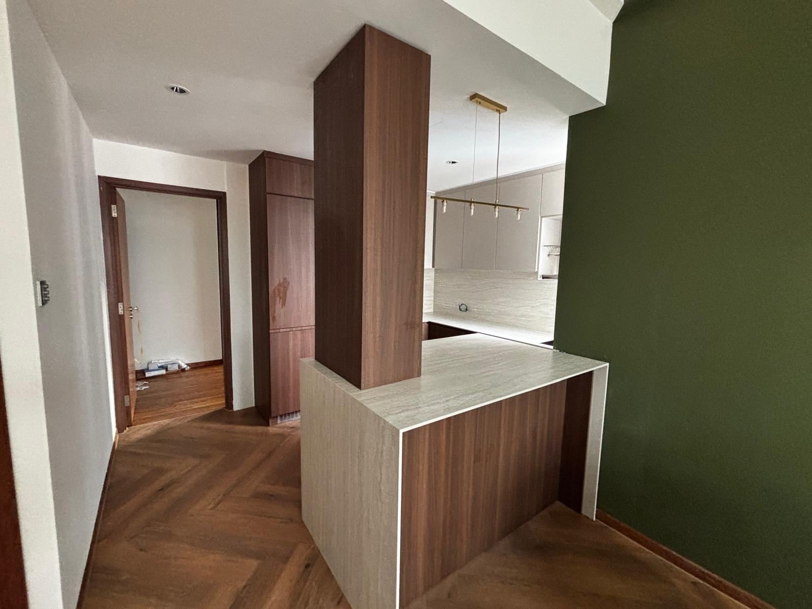 Home renovation Singapore with aluminium carpentry, kitchen island