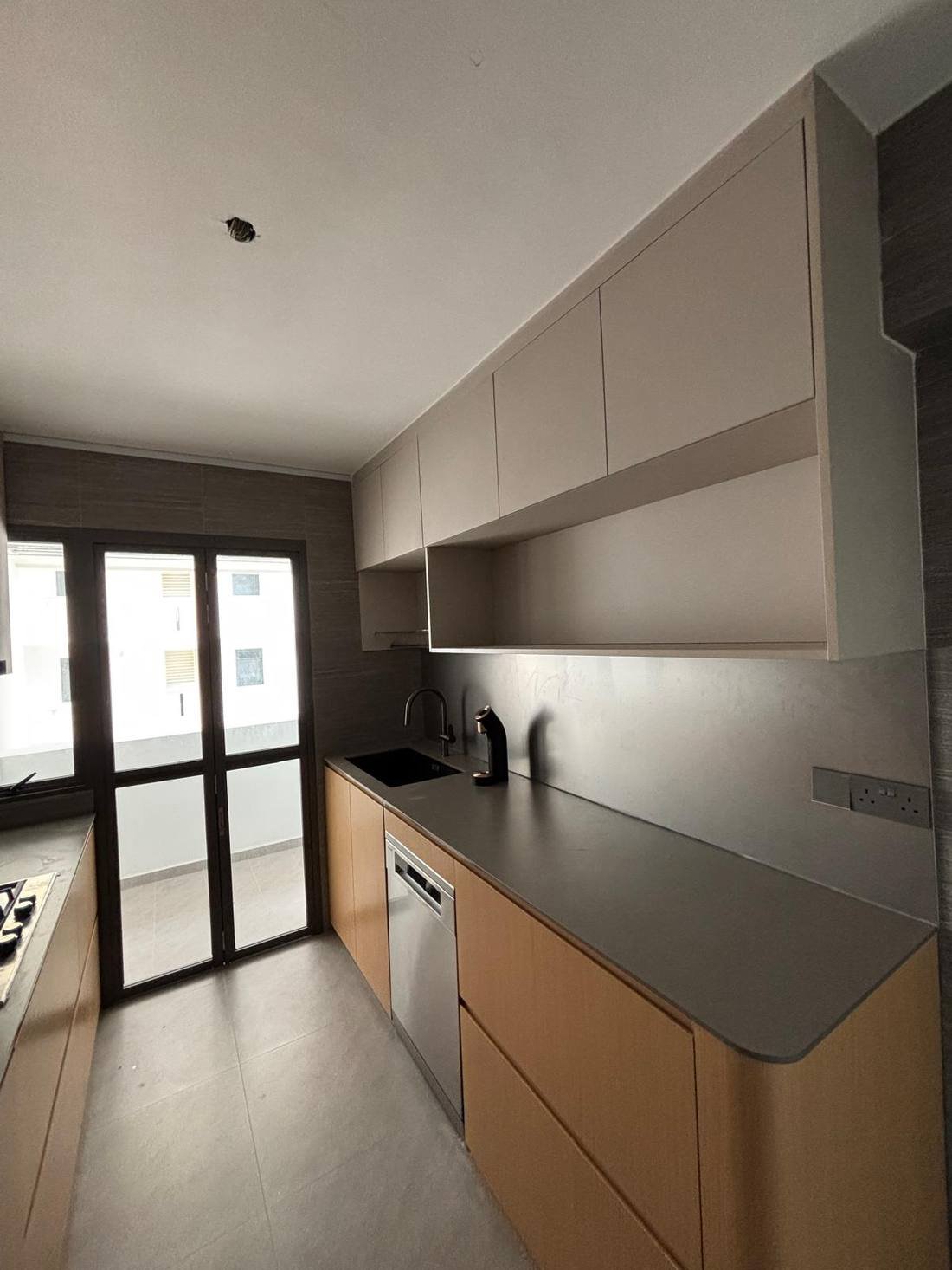 Aluminium kitchen cabinet with dark countertop Singapore