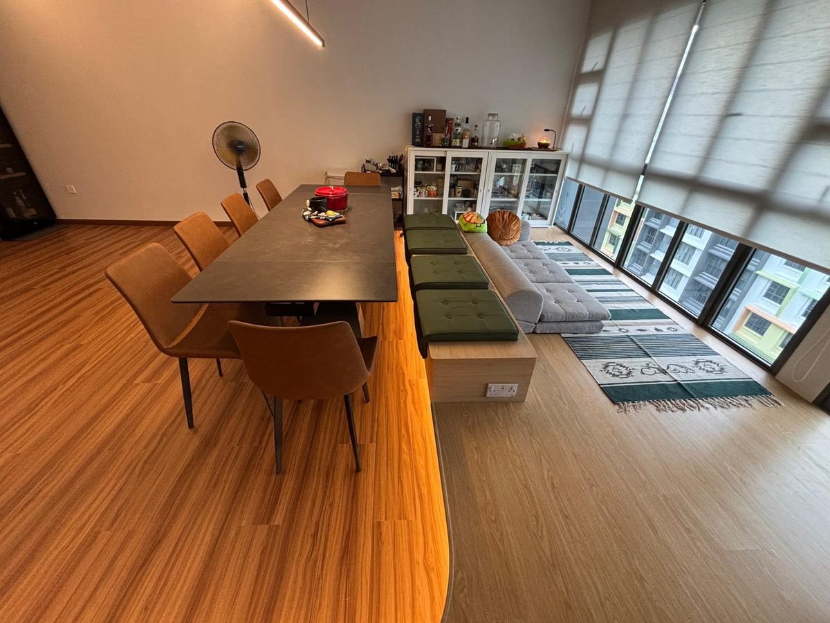 Dining area with built-in bench seating and floor-to-ceiling windows
